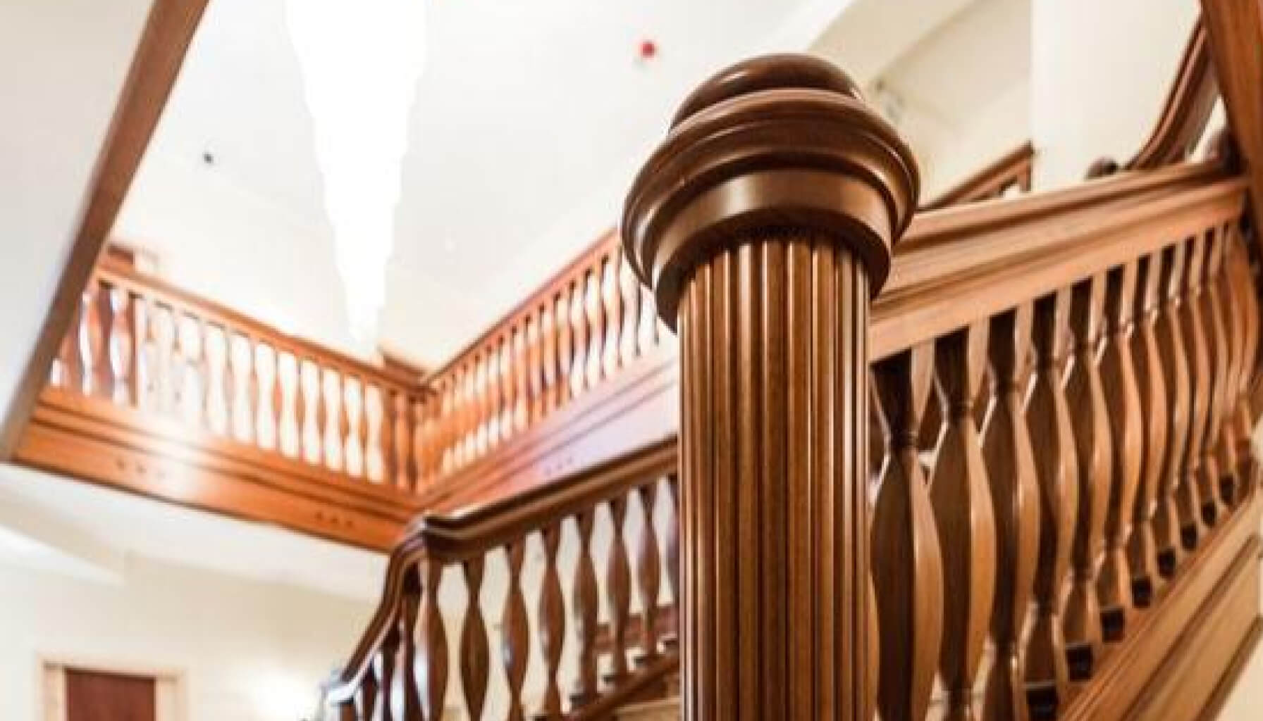 Staircase with Large Turned Newel Posts